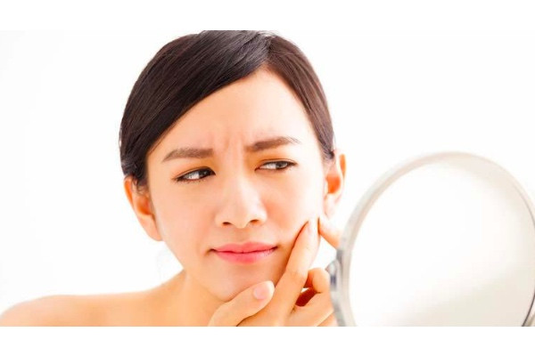 vitamina e acne