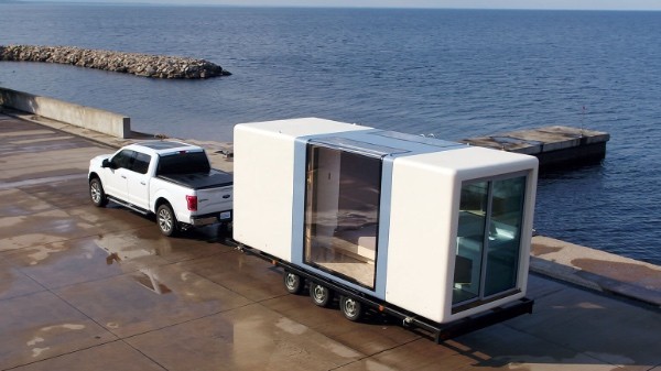 Mini casa prefabricada transportable. 