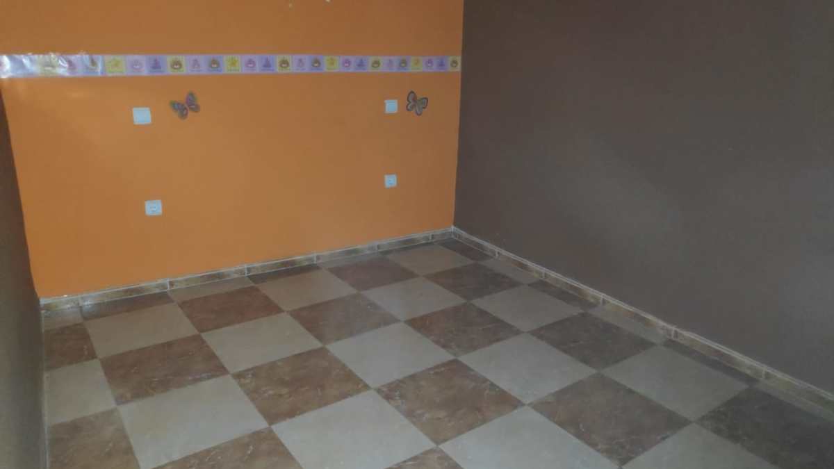 Dormitorios del chalet adosado en venta de Unicaja